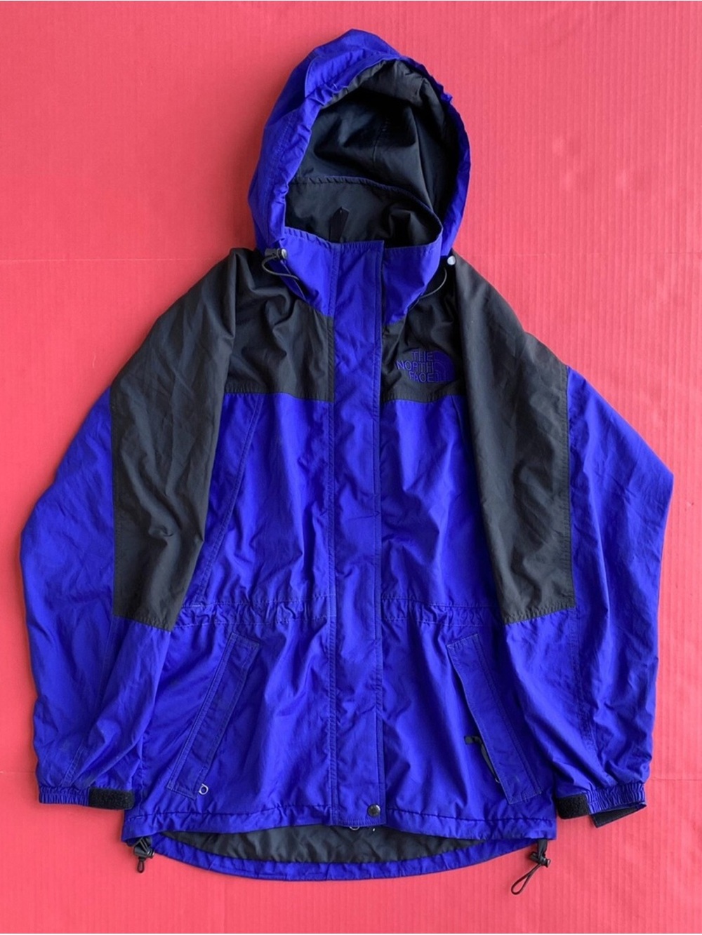 The North Face Purple and Black Women's light wind breaker